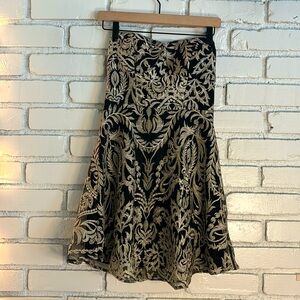 Speechless women’s junior black and gold short strapless dress